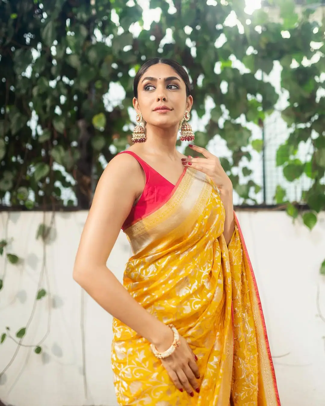 Mrunal Thakur Wearing Beautiful Earrings Yellow Saree Red Blouse